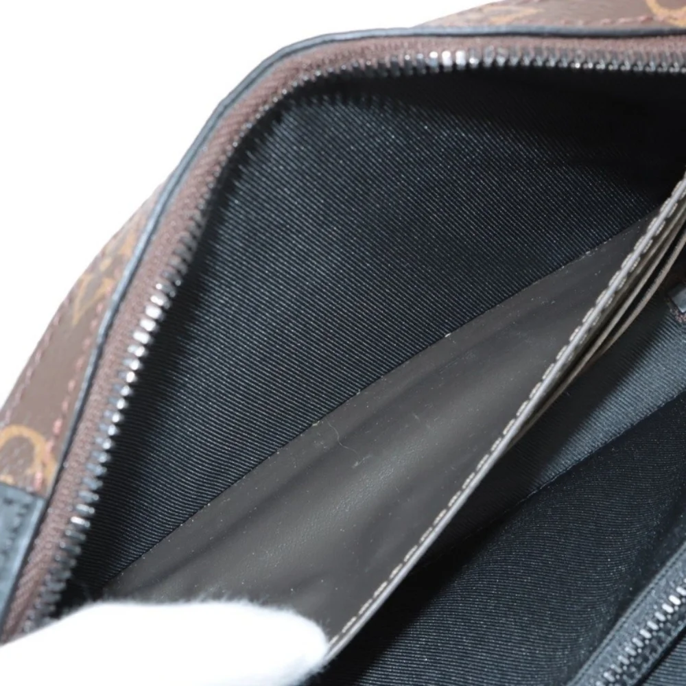 Authentic Louis Vuitton Monogram Taiga Soft Trunk Wallet - Picture 7 of 11